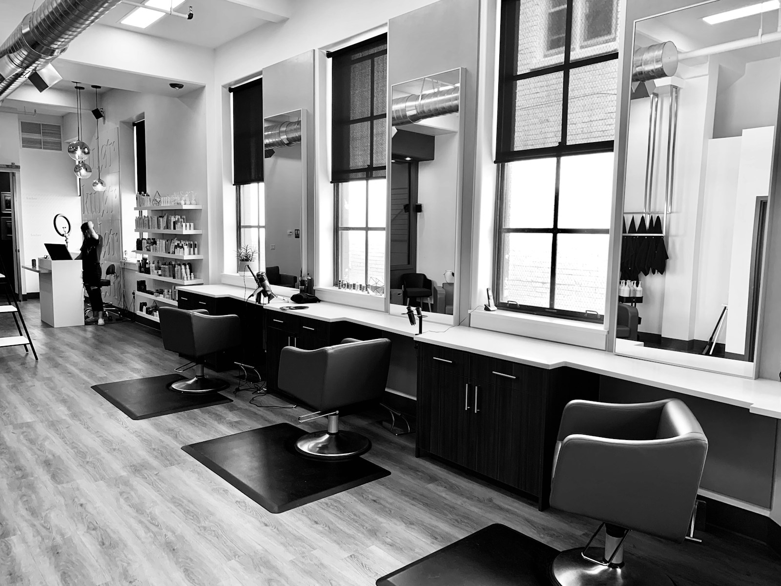 Bright salon interior with styling chairs