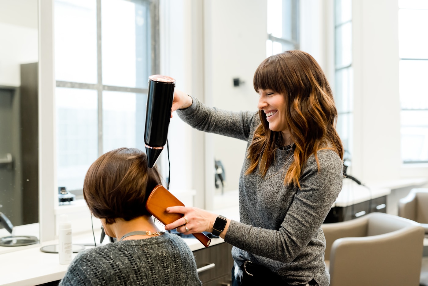 Stylist consulting with a client